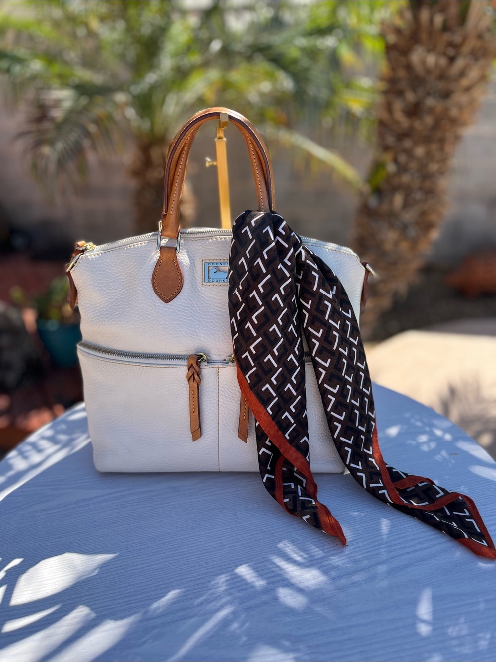 Dooney & Bourke Cream Leather Shoulder Bag with Tan Handles